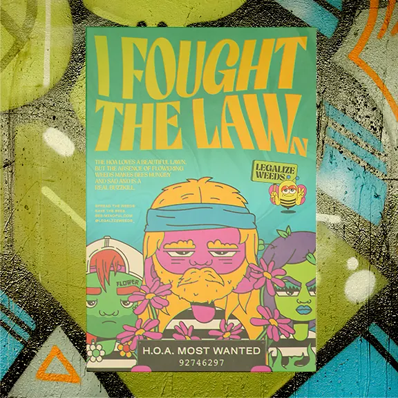 Poster pasted on a graffiti wall reading I FOUGHT THE LAWN, with an illustrated figure and the line H.O.A. MOST WANTED 92746297