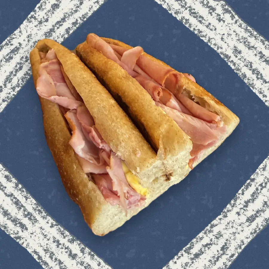 The Jambon-Beurre, photographed in cross-section and floated over a riso print of the Austin skyline.