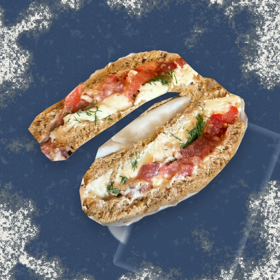 The Slutty Tomato Sandwich, photographed in cross-section and floated over a riso print of the Austin skyline.