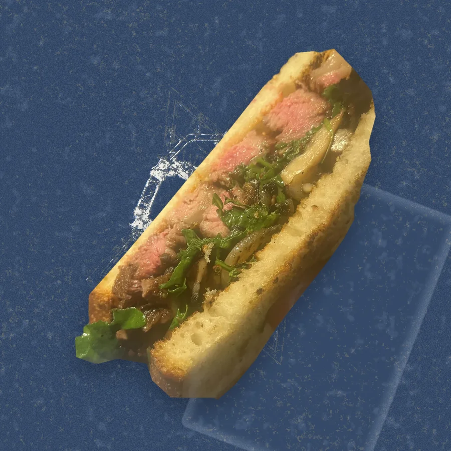 The Steak au Poivre, photographed in cross-section and floated over a riso print of the Austin skyline.