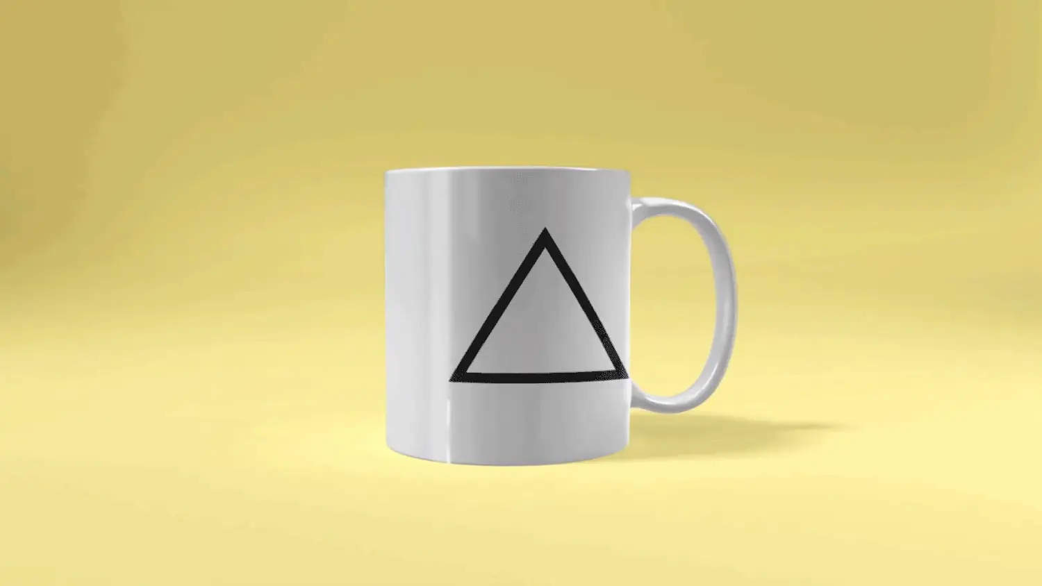 Original triangle mug product image: white mug with a black triangle